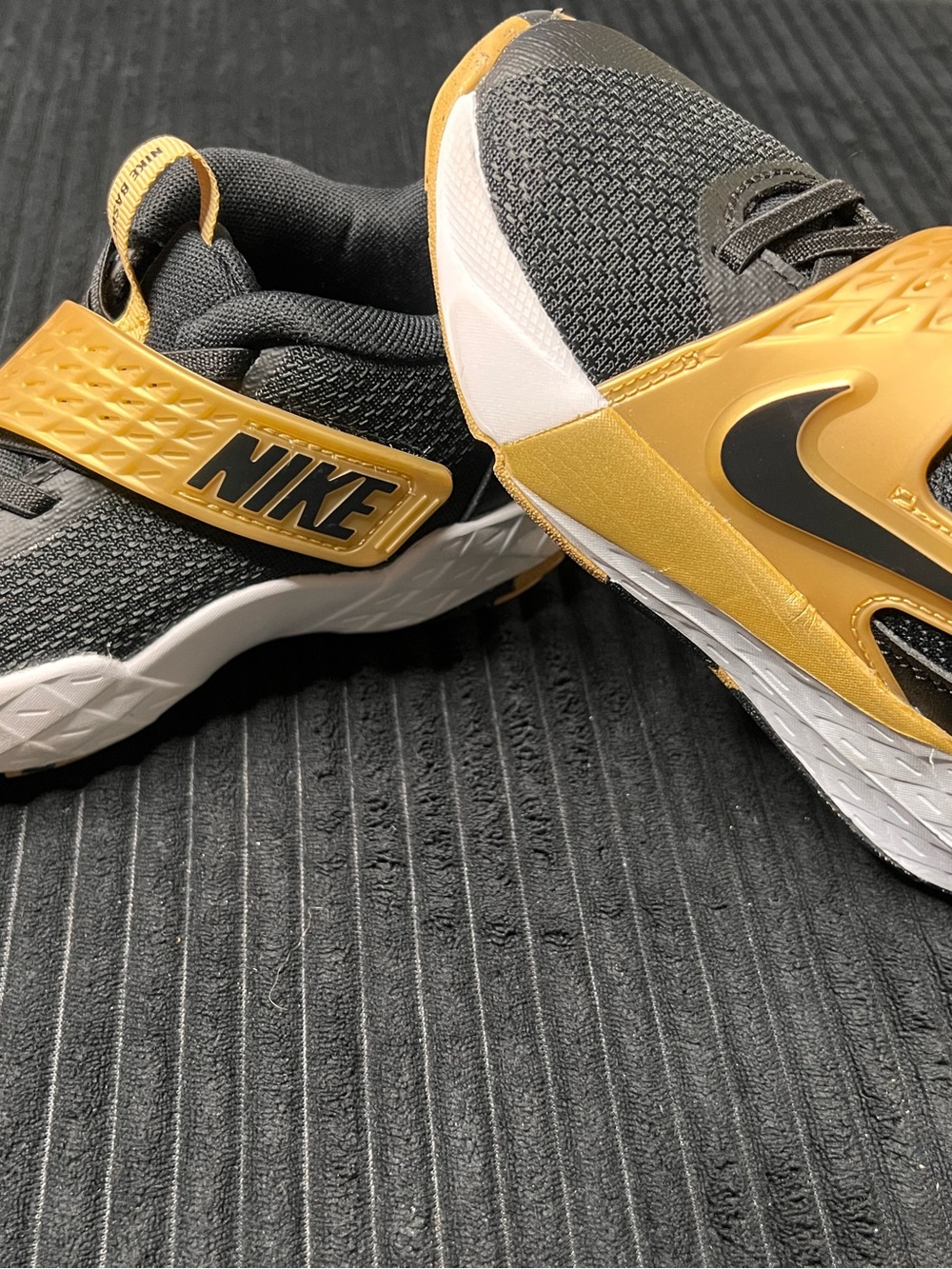 Nike Kids Black and Gold Strap Sneakers